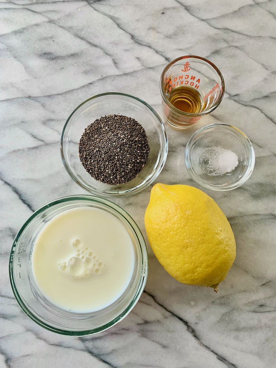 Ingredients assembled for a single serving of lemon chia pudding