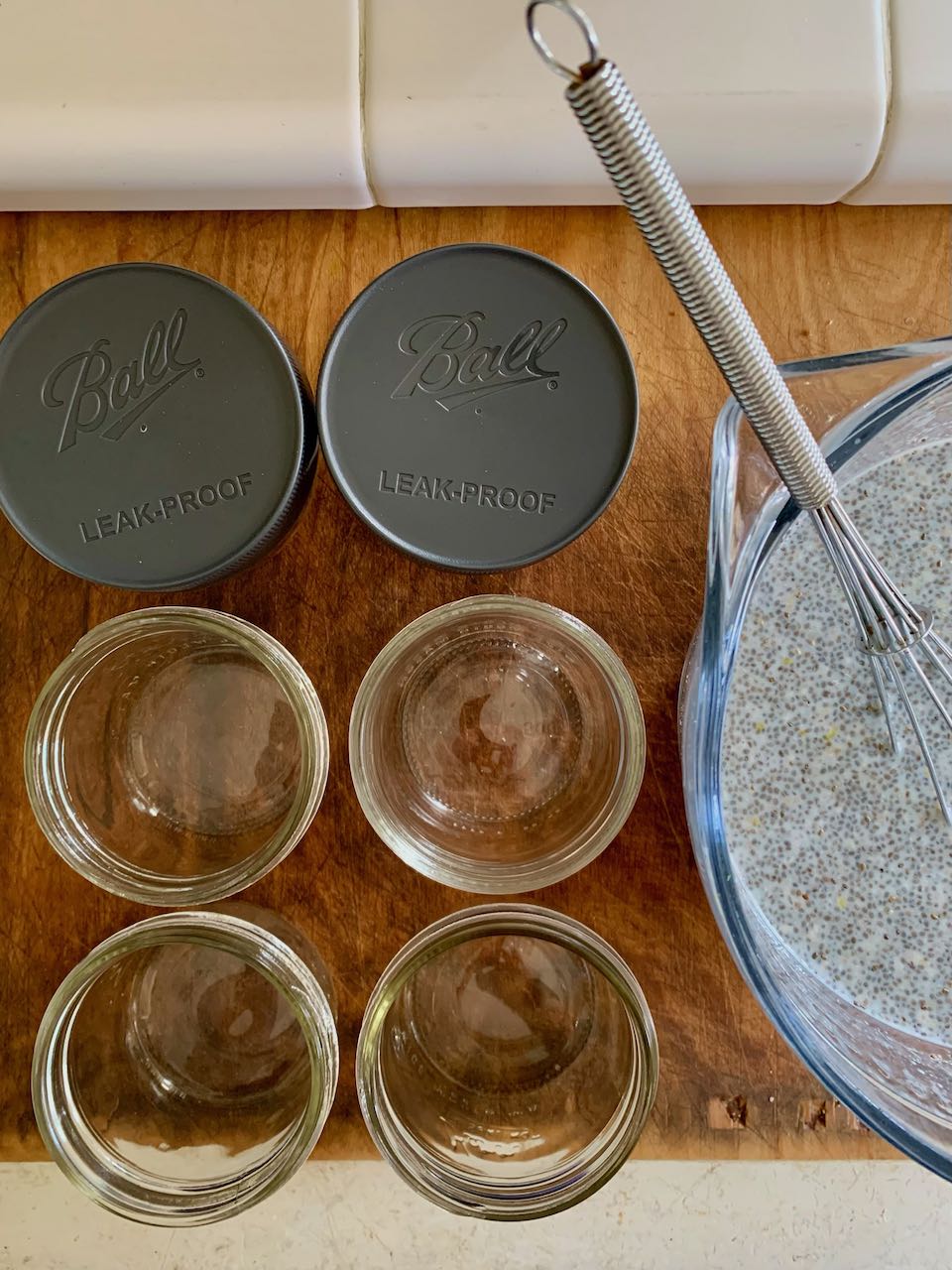 Empty half-pint mason jars ready to e filled with chia pudding