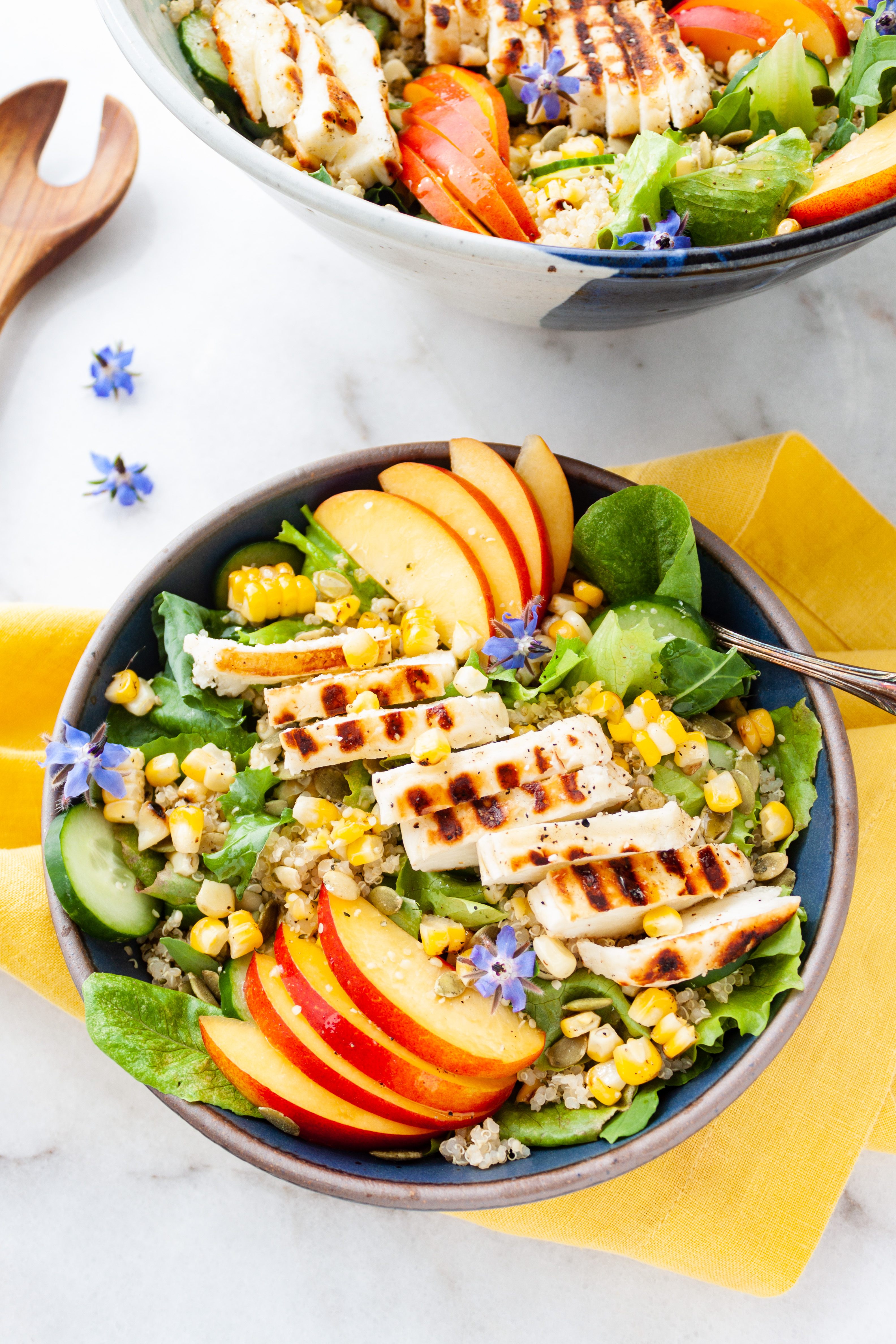 Midsummer Market Salad served in a blue bowl