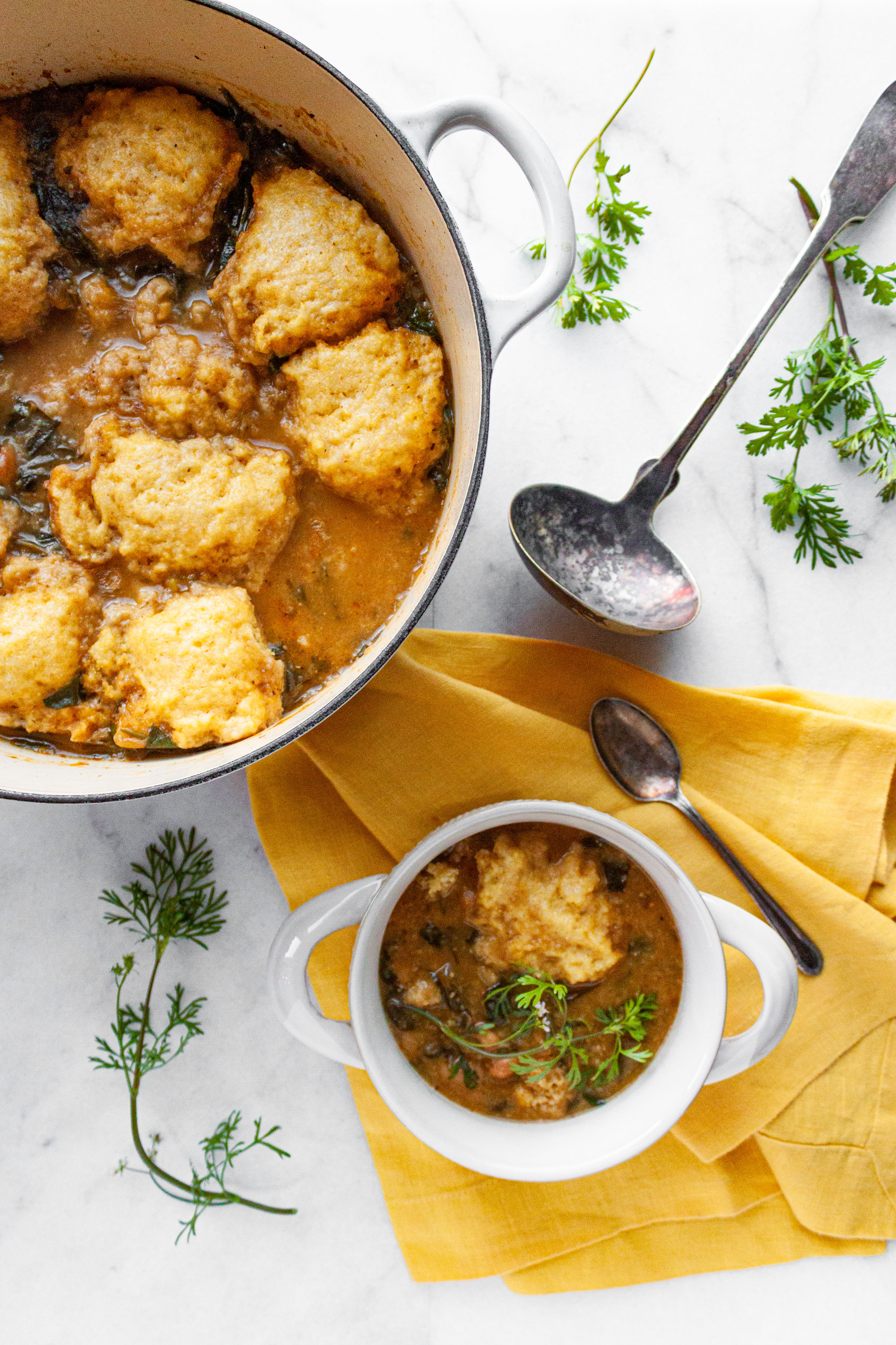 3-Bean Chili Verde served in a bowl with handles on the sides