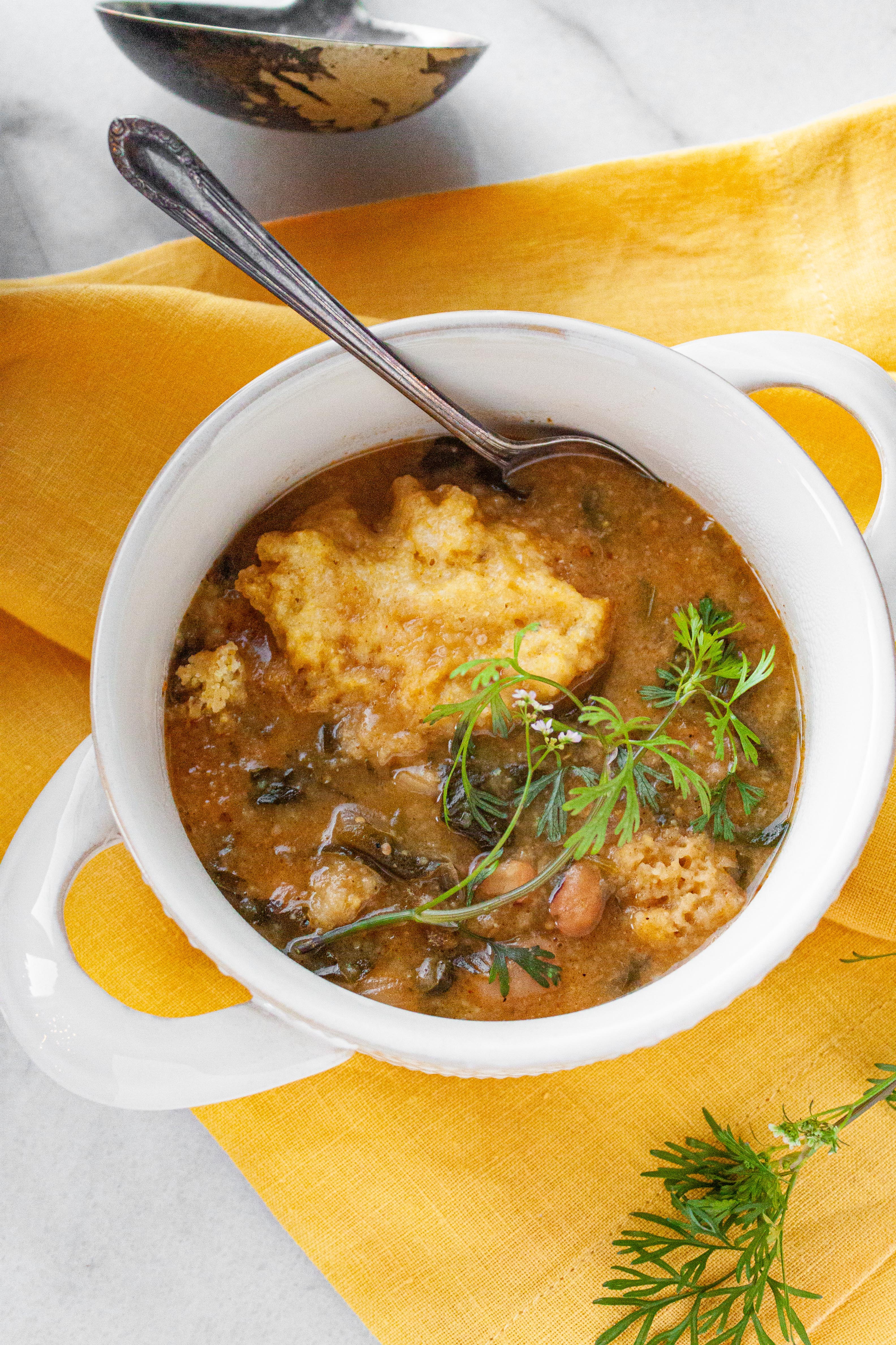 3-Bean Chili Verde served in a bowl with handles on the sides