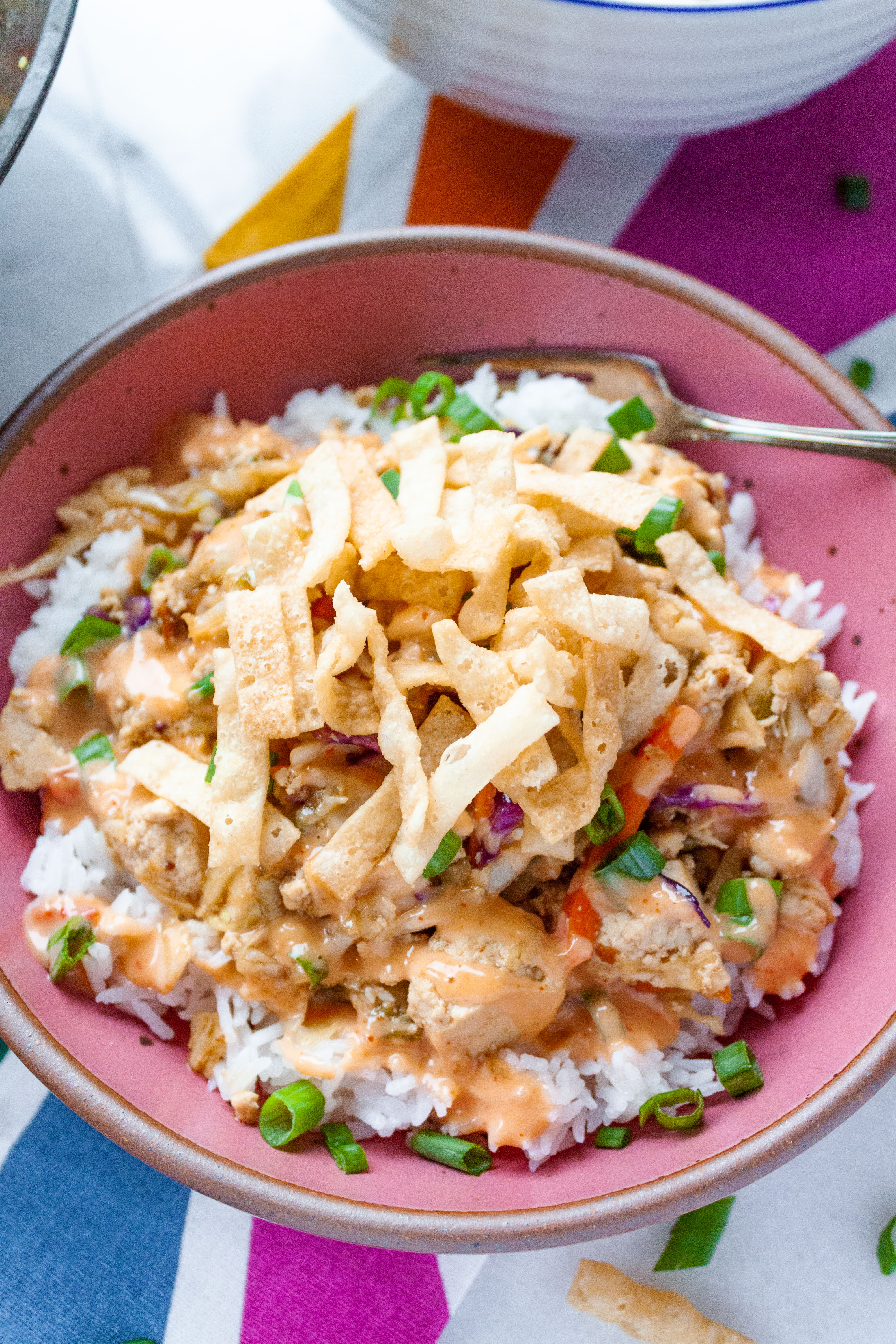 Tofu Egg Roll Bowl topped with fried wonton strips