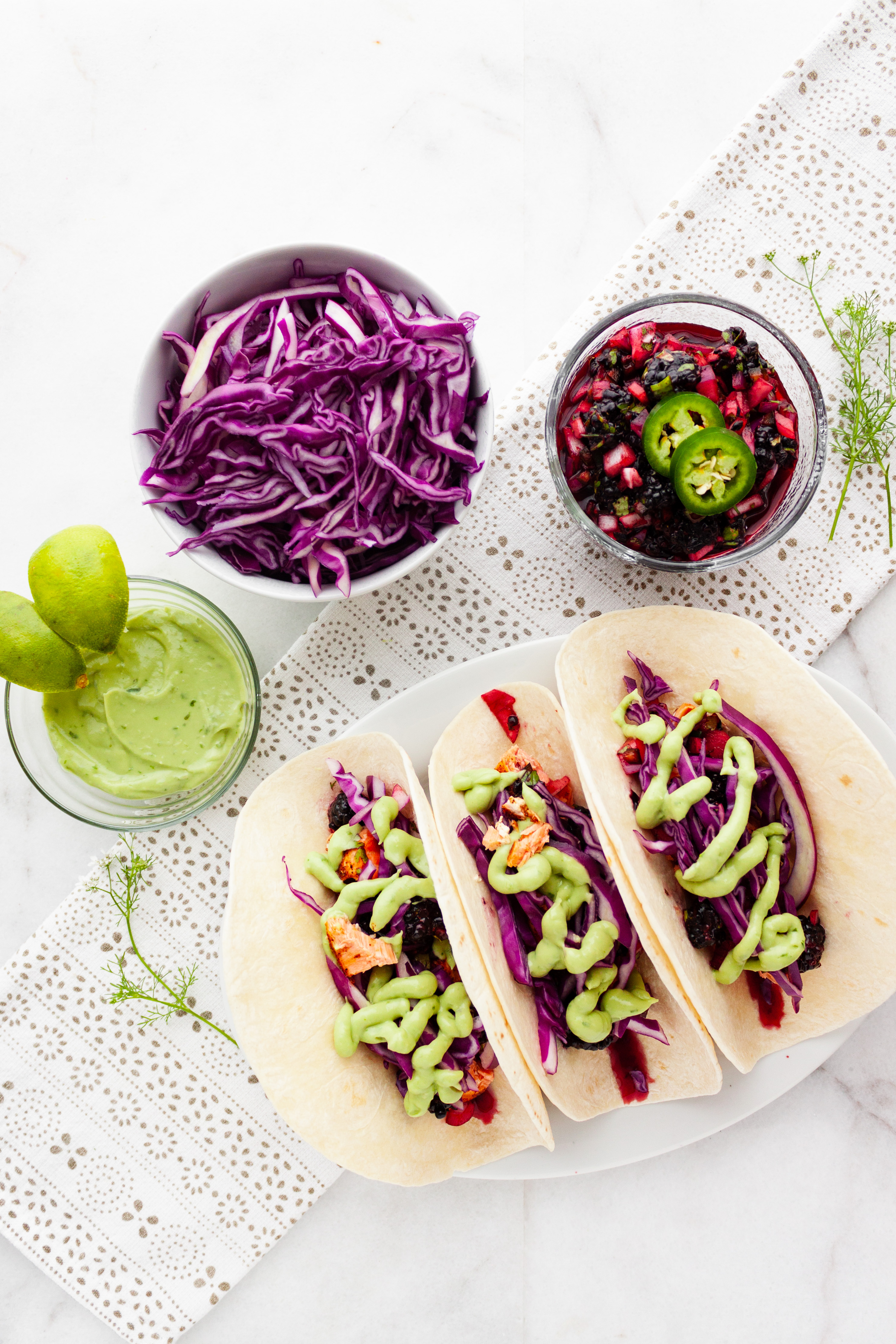 A trio of Roasted Salmon Tacos with Blackberry Salsa
