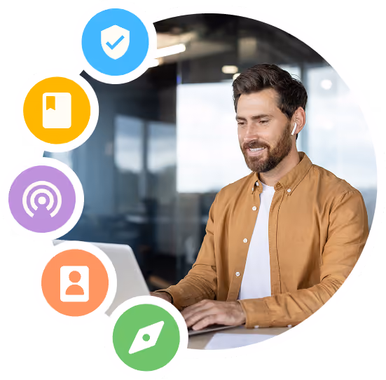 Man working at a laptop, surrounded by GoGuardian product icons.