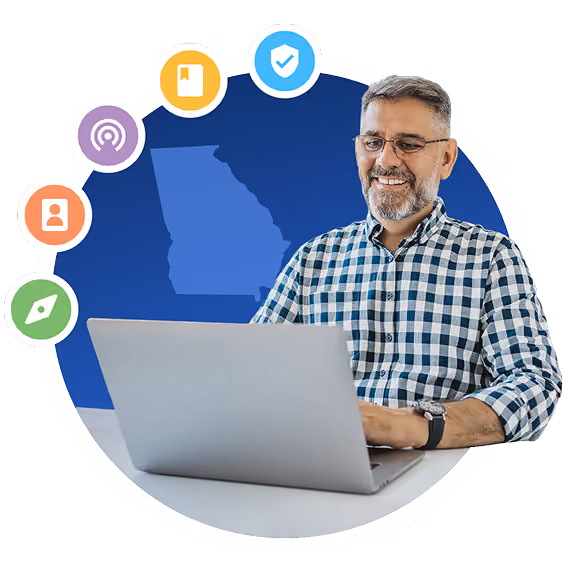 Man working at a laptop in front of an outline of Georgia, surrounded by GoGuardian product icons.