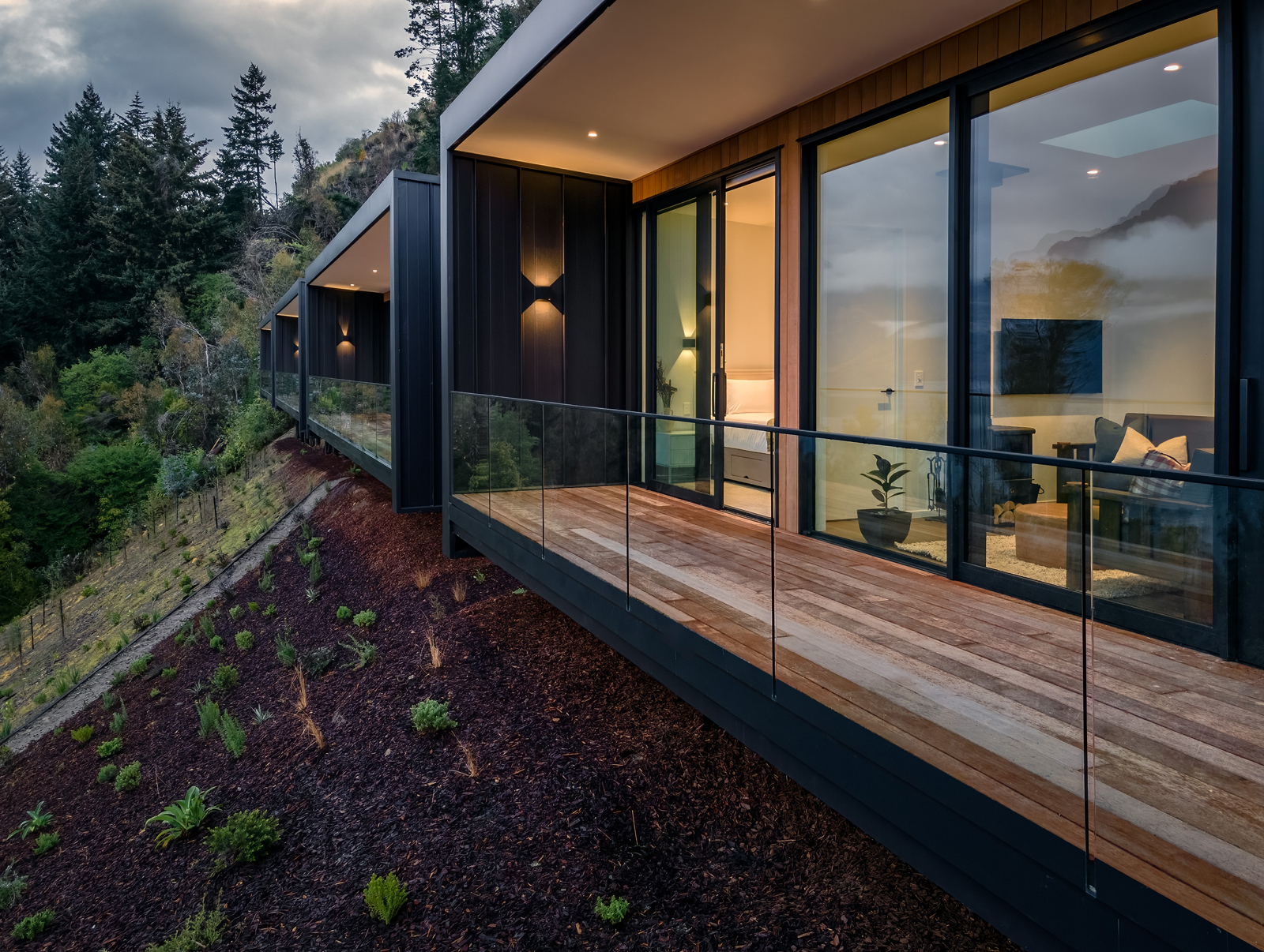 Frameless glass balustrade along the deck of a modern home