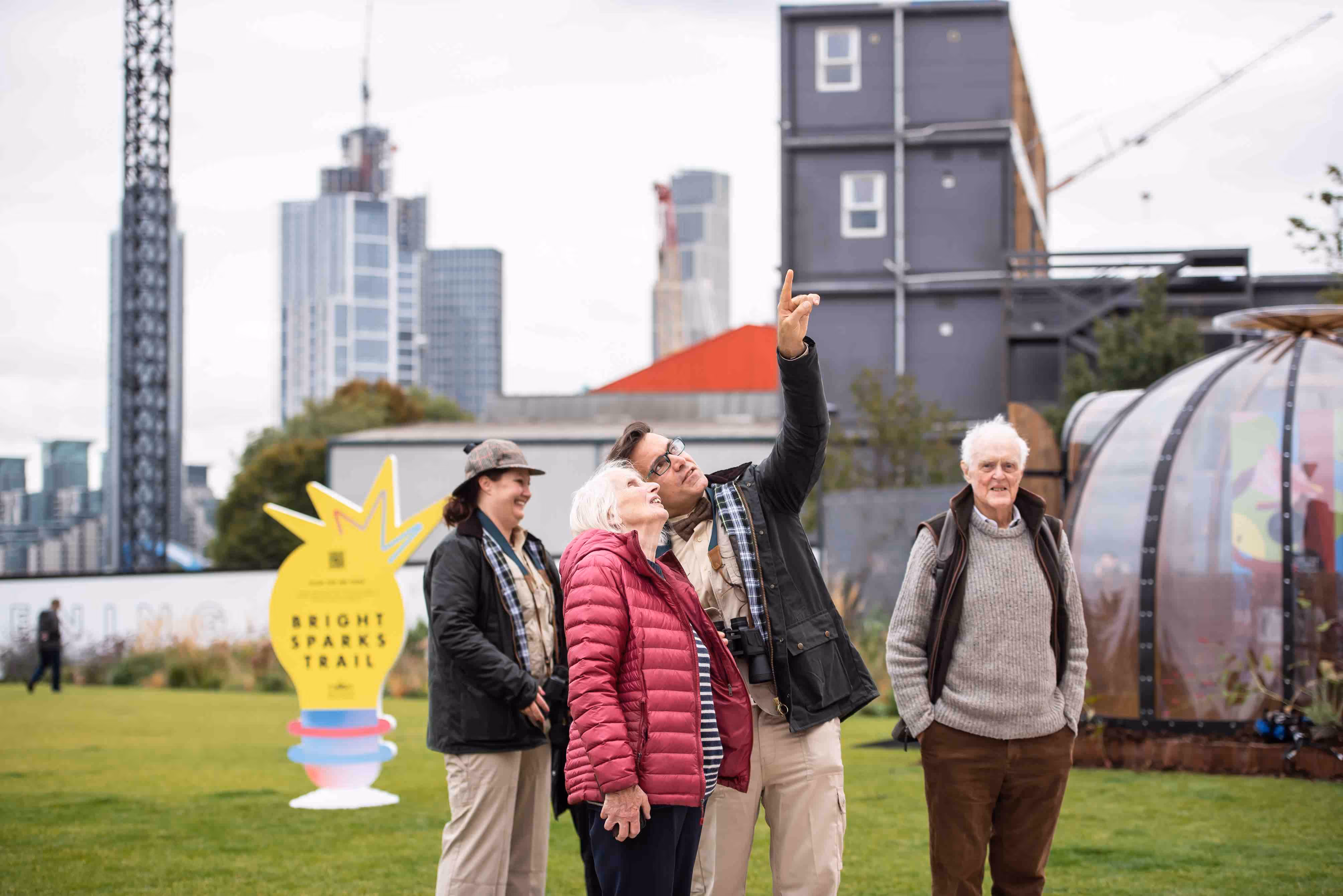 Performers talk to members of the public on the Bright Sparks Trail, explaining the power station's history.