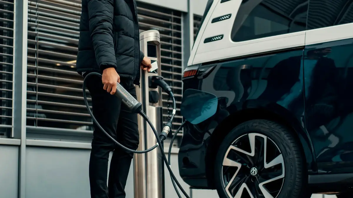 Professional charging their electric car.