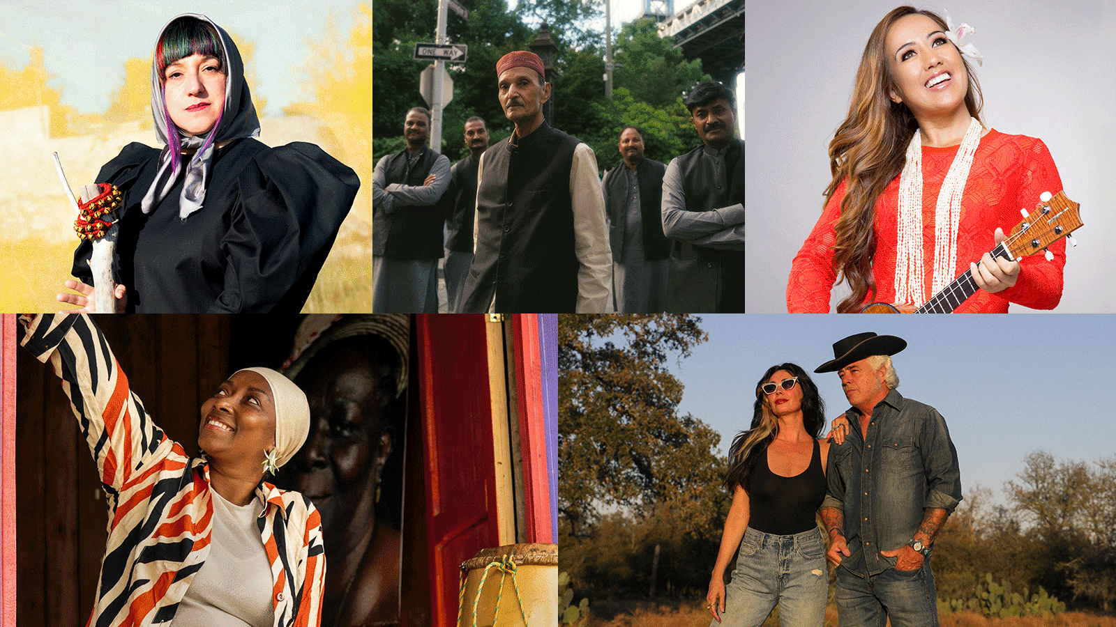A large, engaged crowd in a three-level hall illuminated by blue lights, watches five musicians perform on stage.