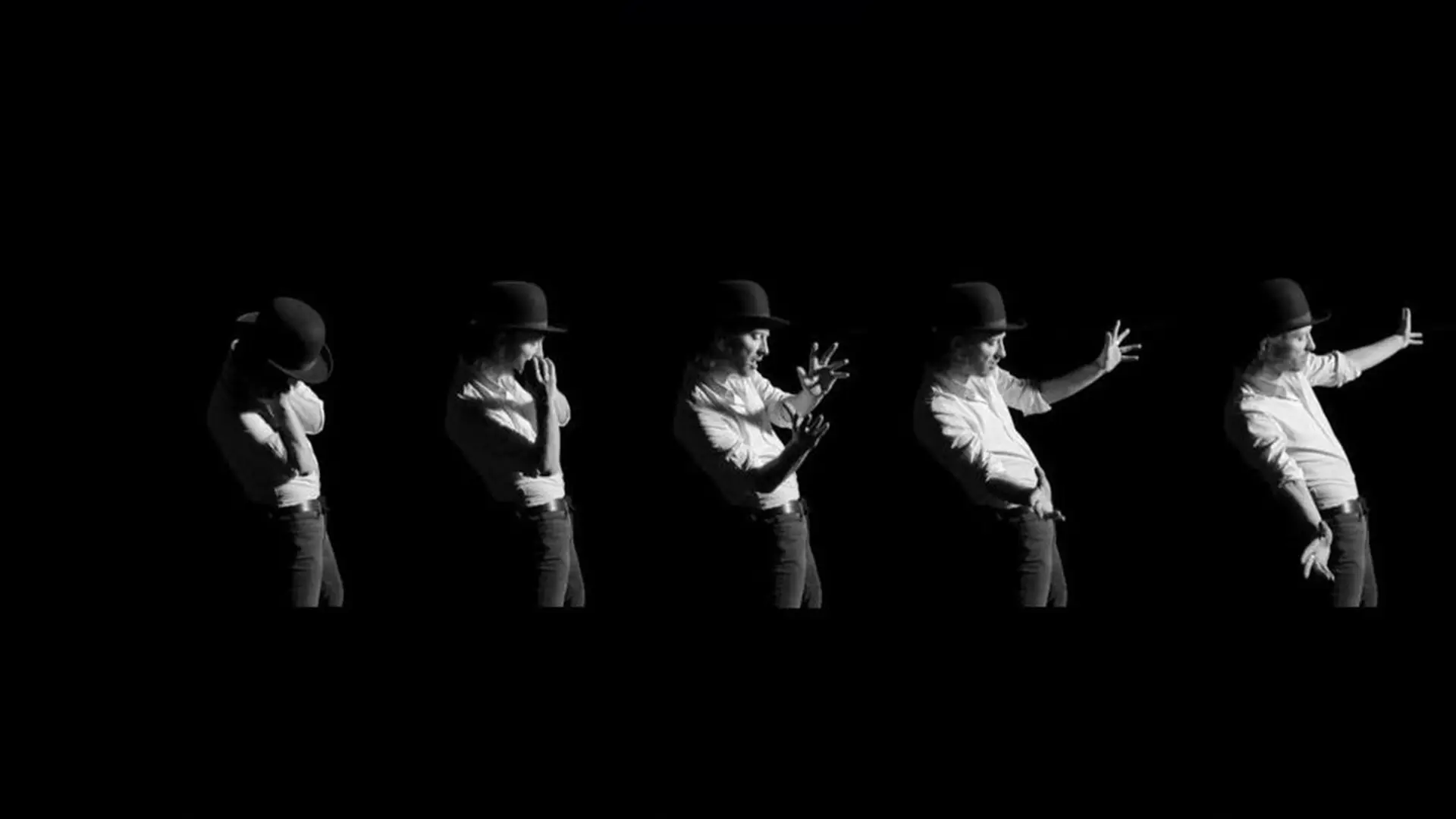 Black and white sequence of a man in a bowler hat performing expressive hand and arm gestures.