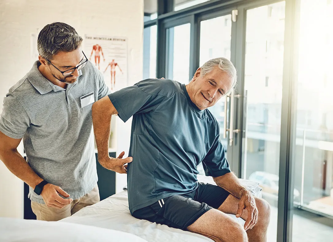 Physical Therapist with patient
