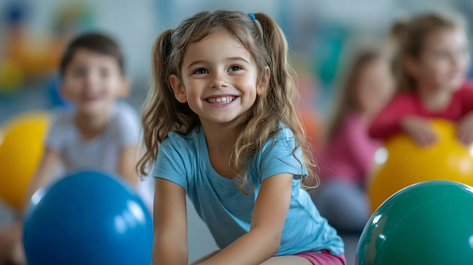 Chile playing with group during pediatric occupational theraply session