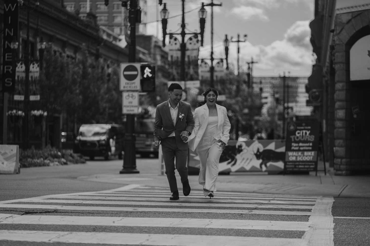 Wedding couple walking in Downtown Calgary