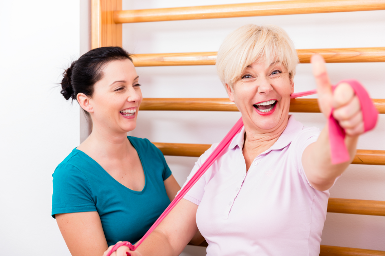 Stroke patient regaining strength with physical therapy support