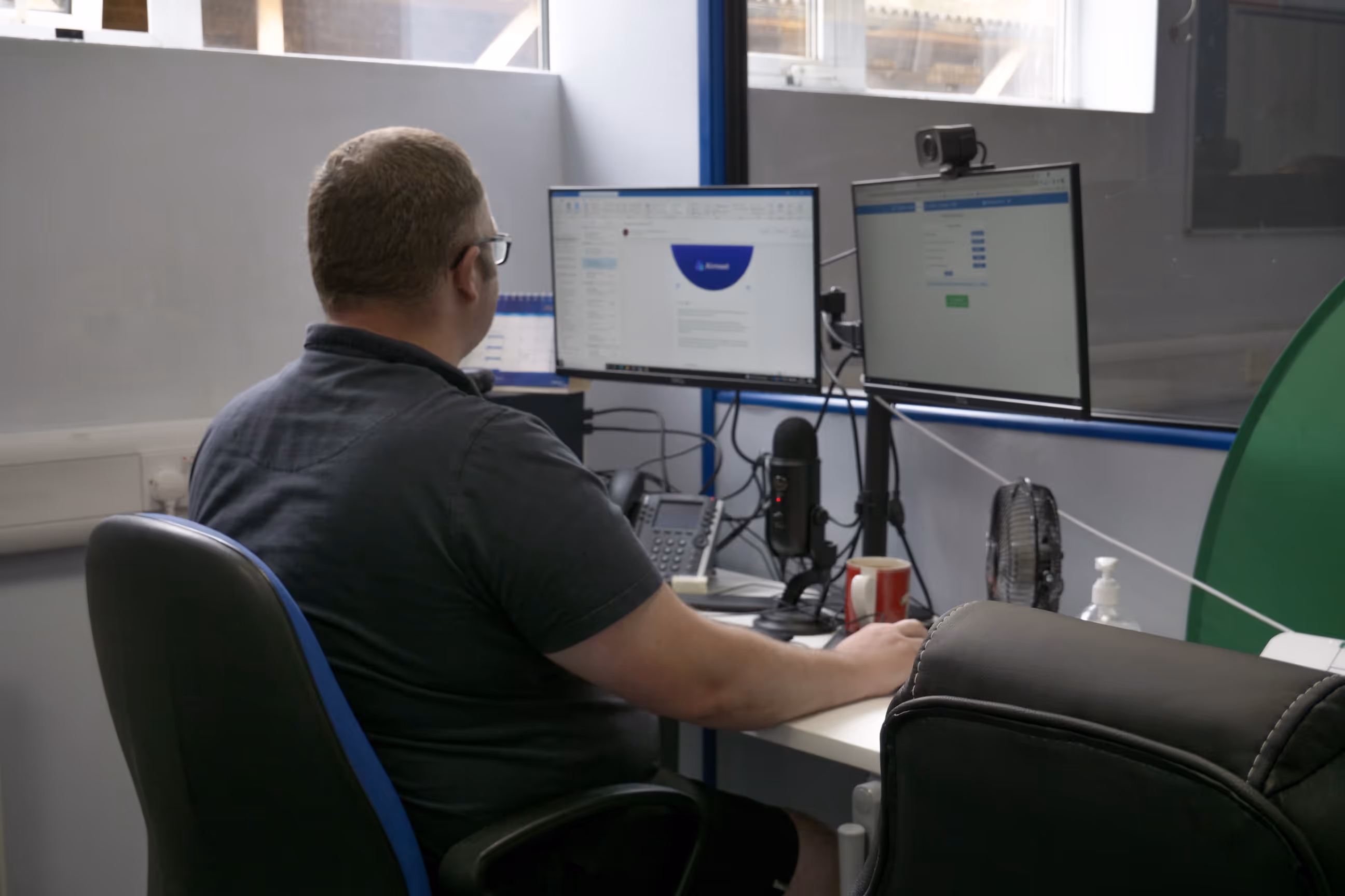 Man working in an office. Located in the Widford Business Centre, Chelmsford, Essex