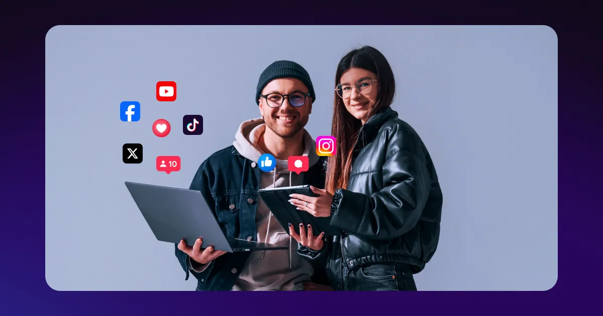 Two women looking at social media metrics on her phone and computer.