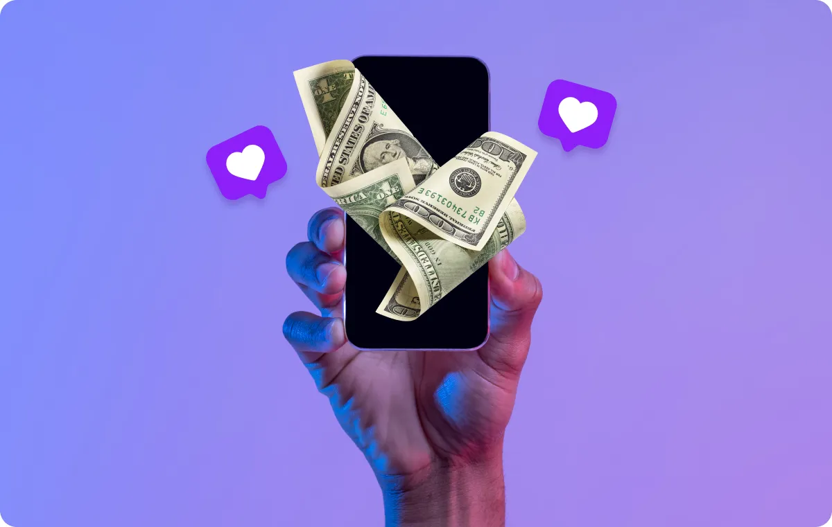 Hand holding a phone with icons for likes and money, symbolizing social media growth and monetization.