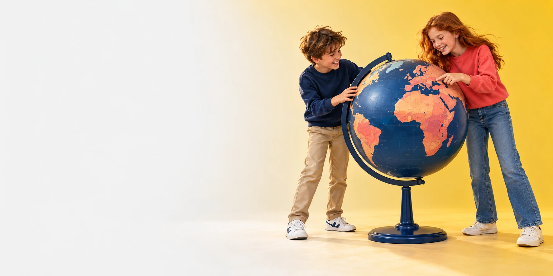 Two children laughing and exploring an oversized upright globe together