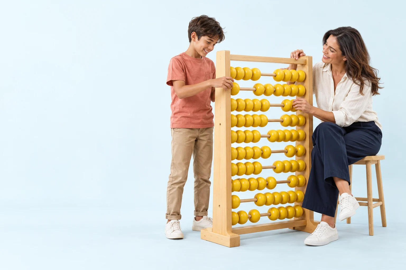 A parent and child exploring an oversized yellow abacus together