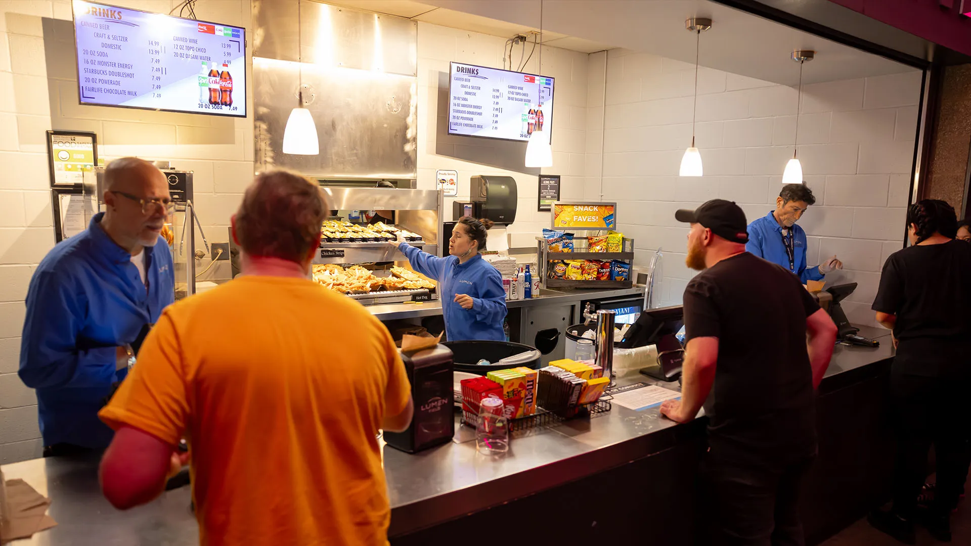 Guests being served at the WAMU Theater concession stand