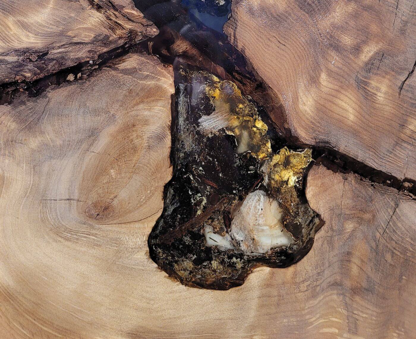 Worldwide unique amber table with original golden amber in a unique table top in Kauri root wood as an artistic wooden table and valuable investment