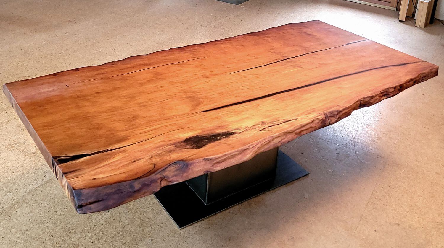 High-quality dining table made from old tree trunk wood with special ceramic varnish and epoxy resin to finish the durable table top