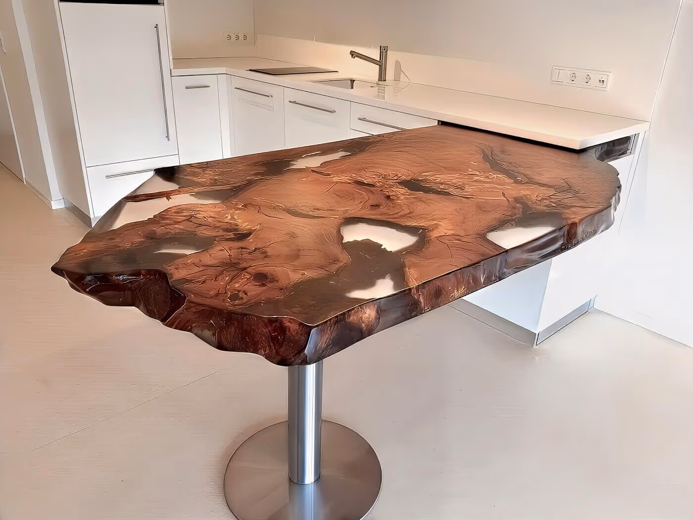 A unique table made of kauri burl wood in the exhibition kitchen, serving as a custom dining table for Luxembourg and Switzerland and a work of natural art
