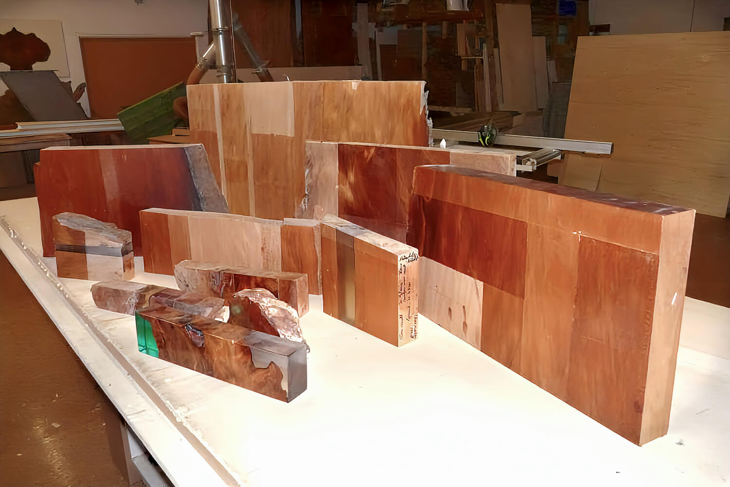 Experiments with kauri wood using various finishing techniques by a master cabinetmaker to create a high-quality table