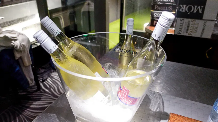 A glass full of champagne and ice on Rubin Group's booze cruise.
