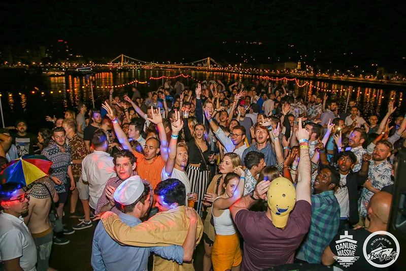 Young people partying on Budapest party boat.