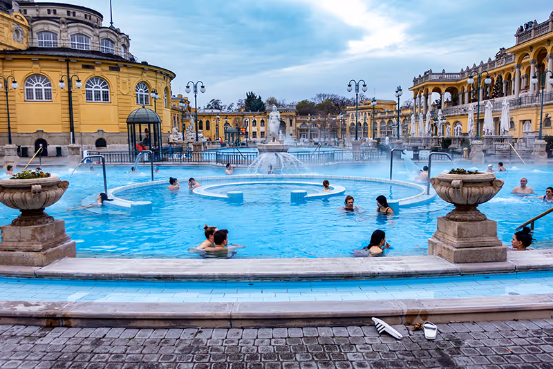 A group of people in a large swimming pool