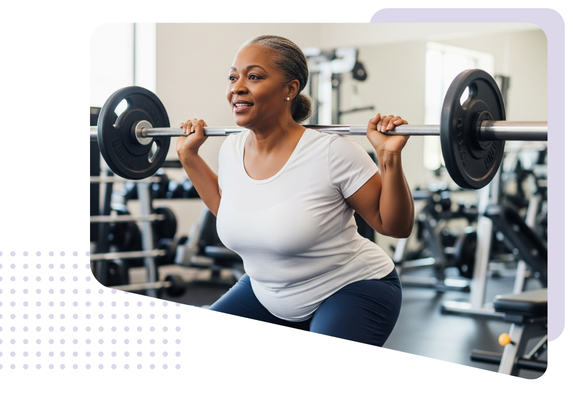 Male working out at gym with female trainer guiding him 