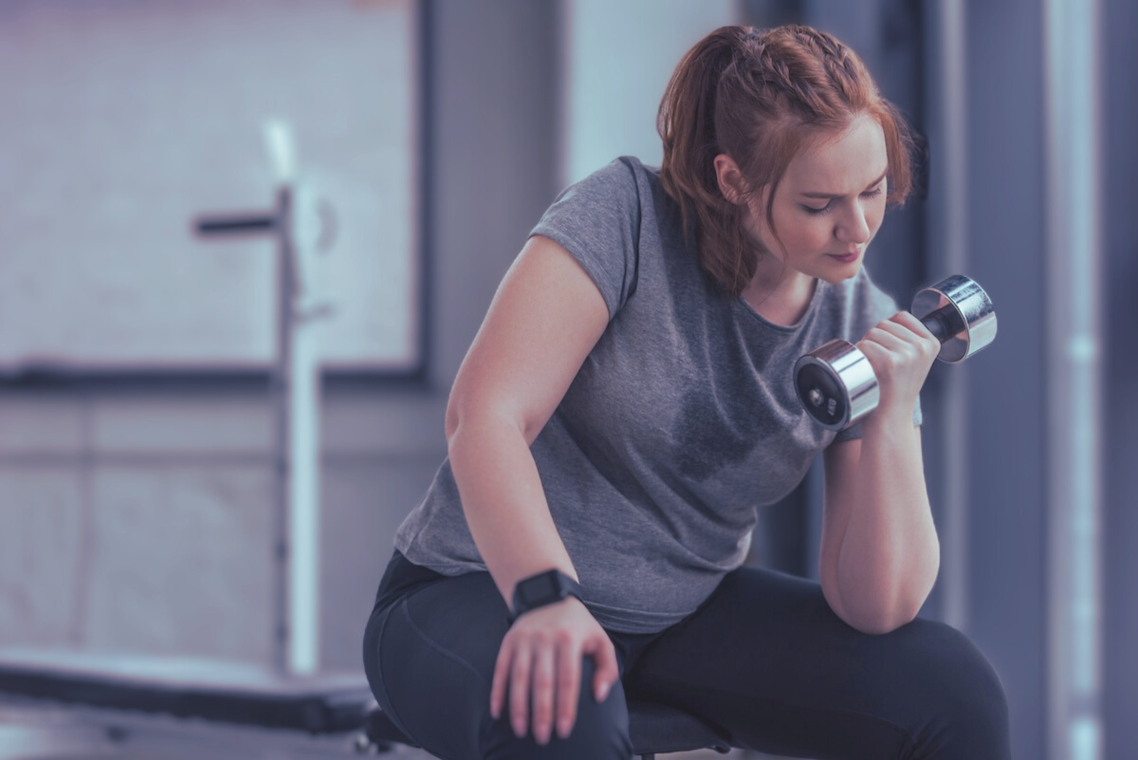 Woman strength training with dumbbells for longevity and healthy aging