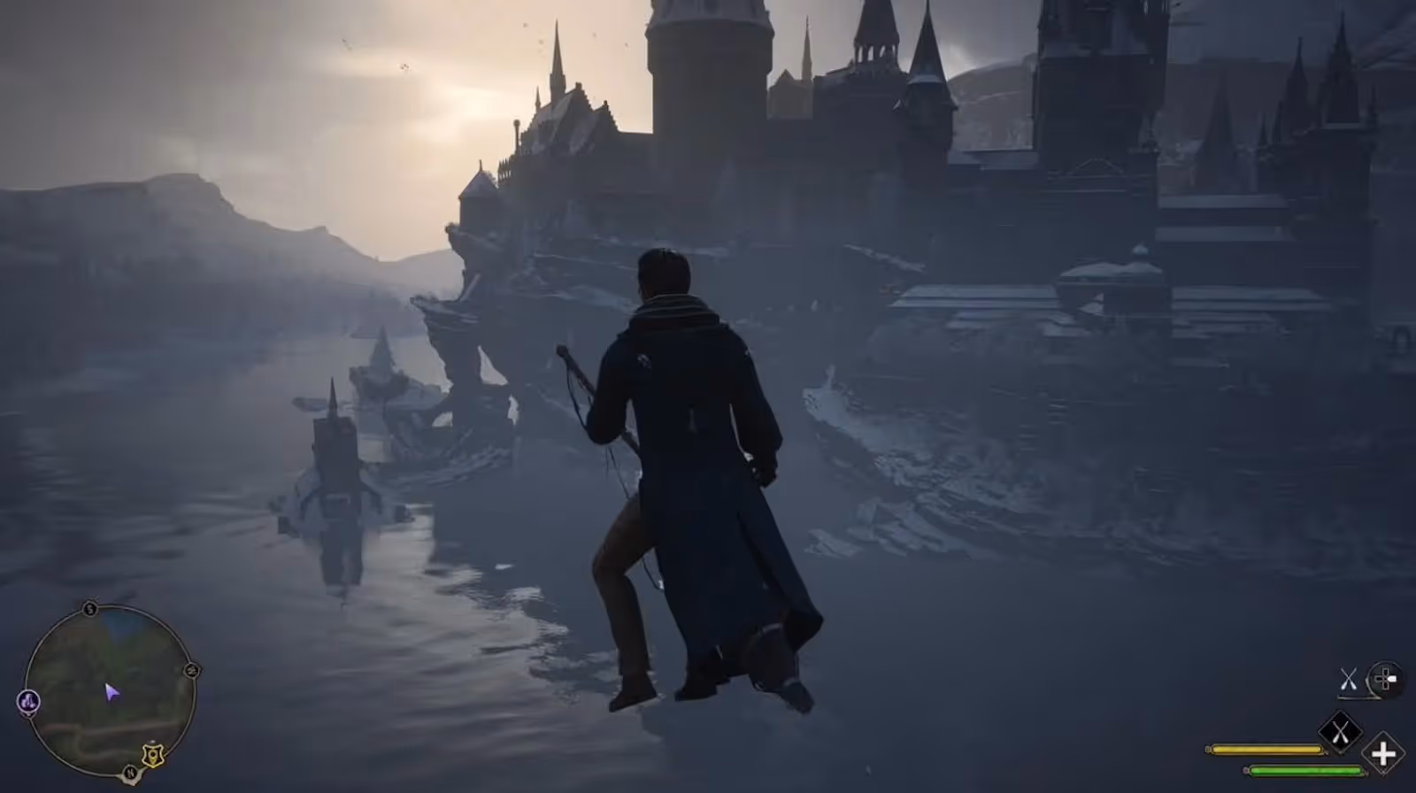 Player flying on a broom around the Hogwarts grounds