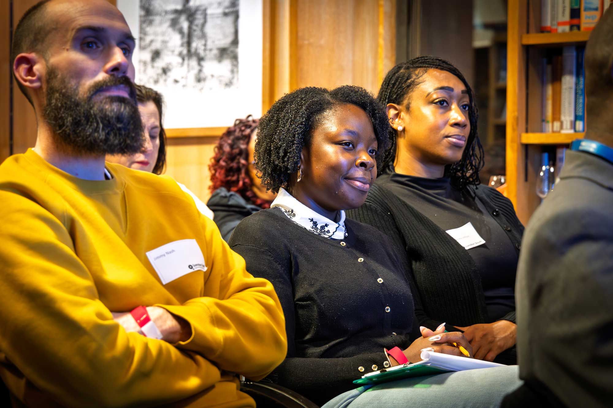 Delegates listening closely during a Diverse Leaders network session.