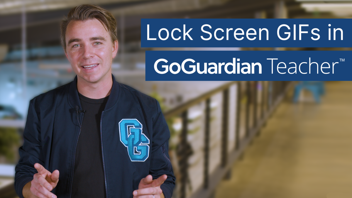 A GoGuardian employee looks at the camera with hands raised