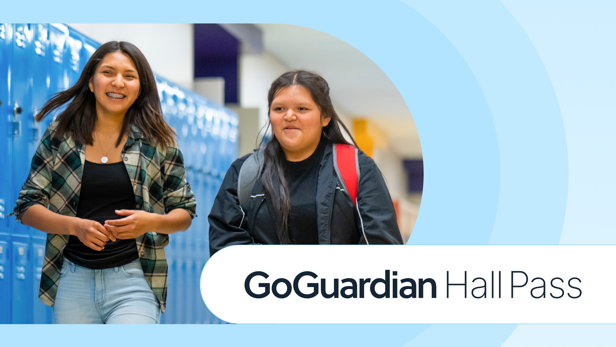 Two students standing in a hall with the words GoGuardian Hall Pass