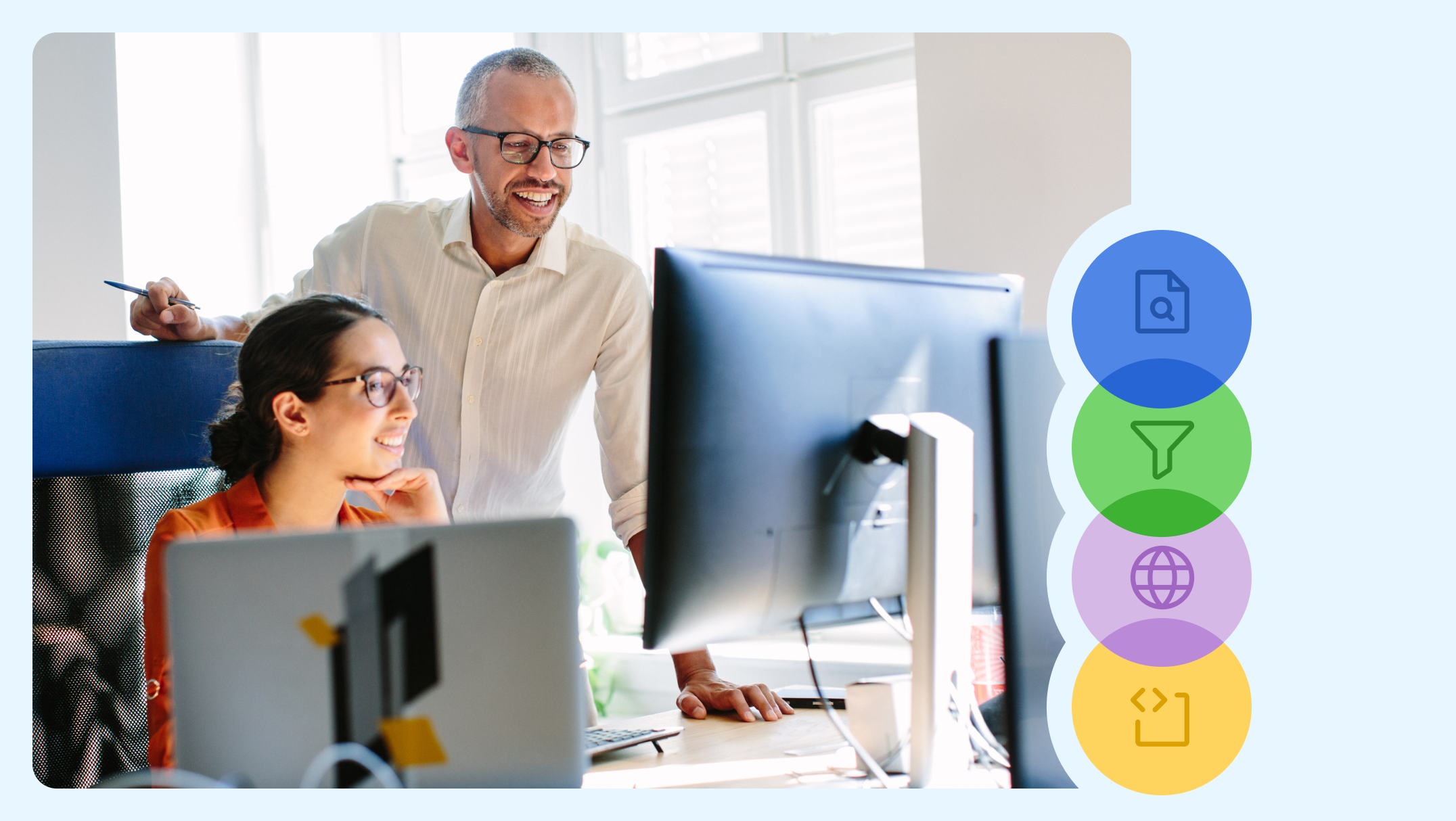 Two teachers at a computer