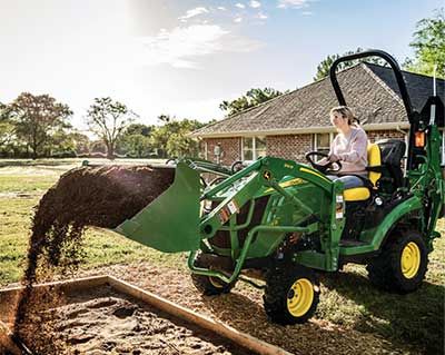 John Deere lawn tractor with trailer
