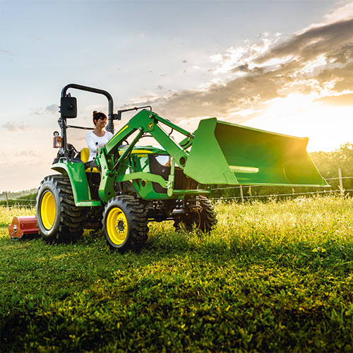 John Deere lawn tractor with trailer