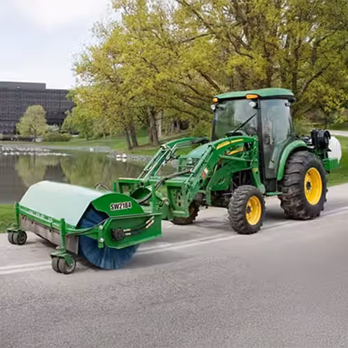 John Deere Combine harvesting in field