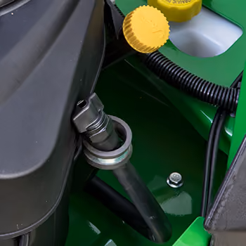 Engine oil check/fill and drain tube