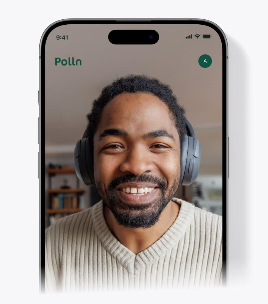 Smiling man with headphones wearing a cream ribbed sweater on a smartphone screen with Polln logo.