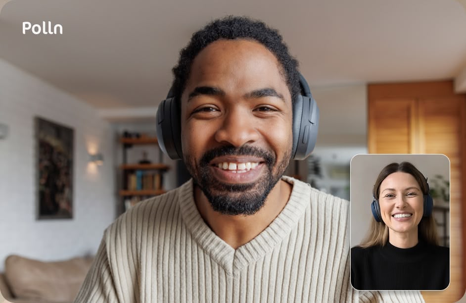 Smiling man wearing headphones on a video call with a smiling doctor who also wears headphones.