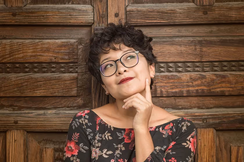 A woman contemplating her property sale options