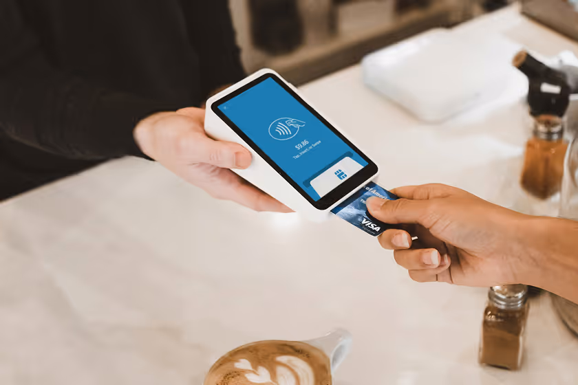 A person paying using a credit card