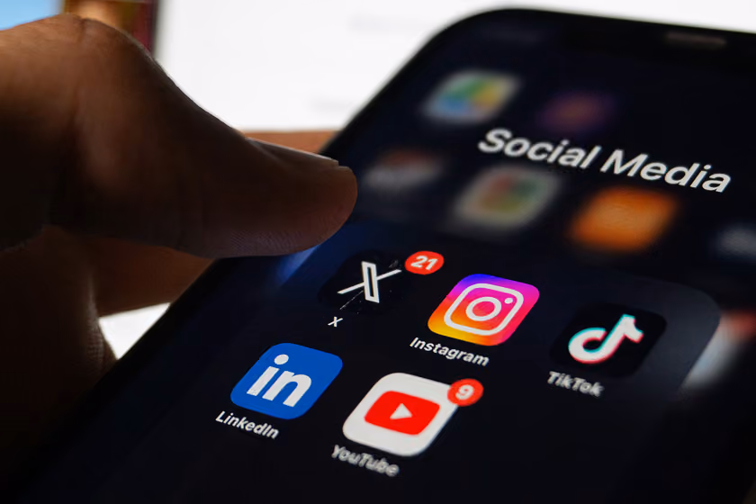 Social meia icons on a mobile hone