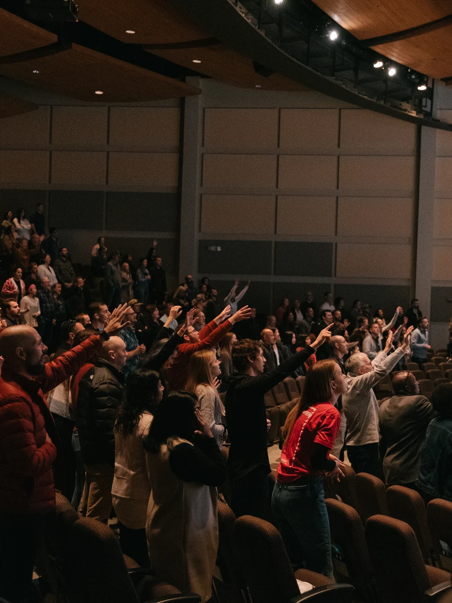 a large group of people during a worship service
