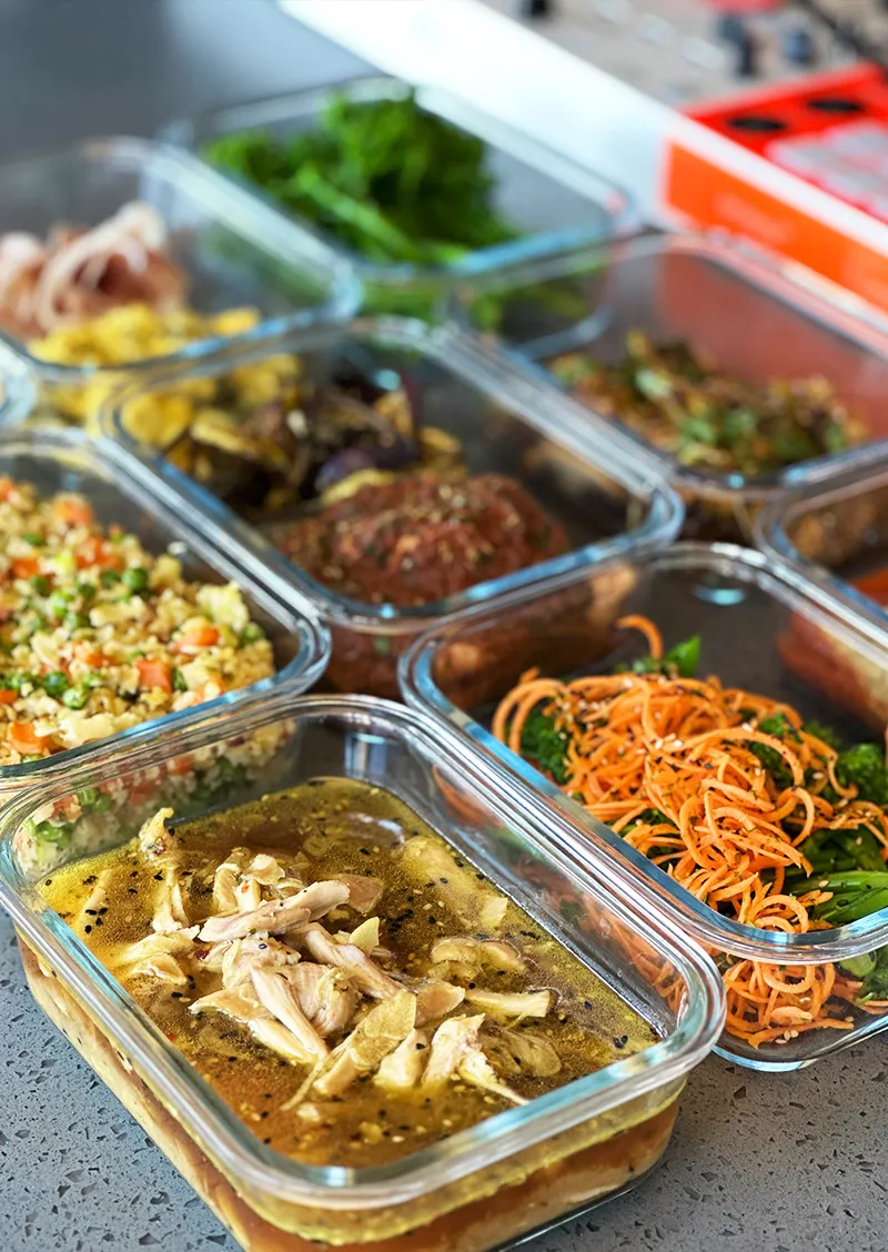 Personal chef meal prep meals in glass containers
