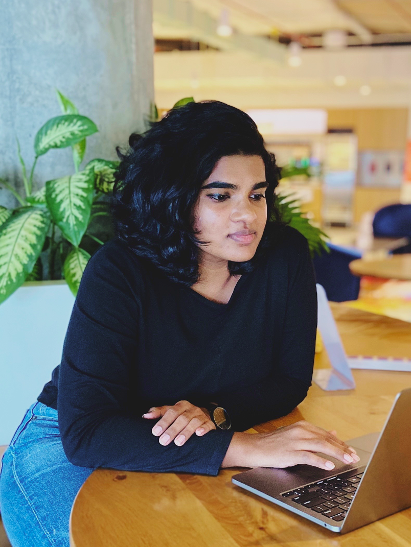 Mythili Hariharan working on Laptop